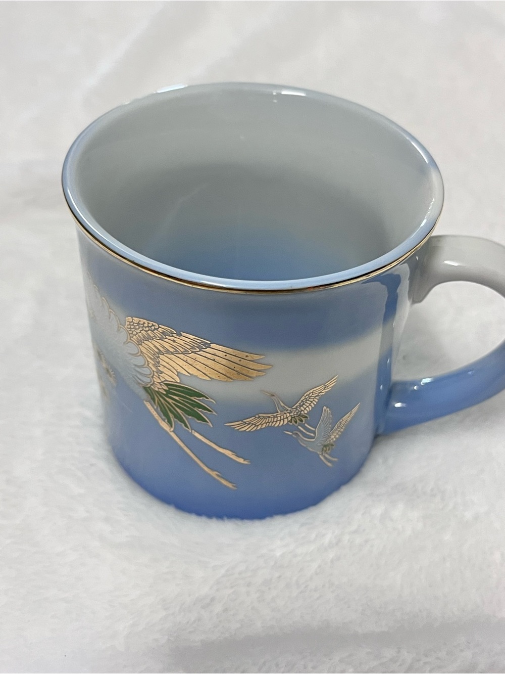 Blue Ceramic Mug with Gold Crane Motif